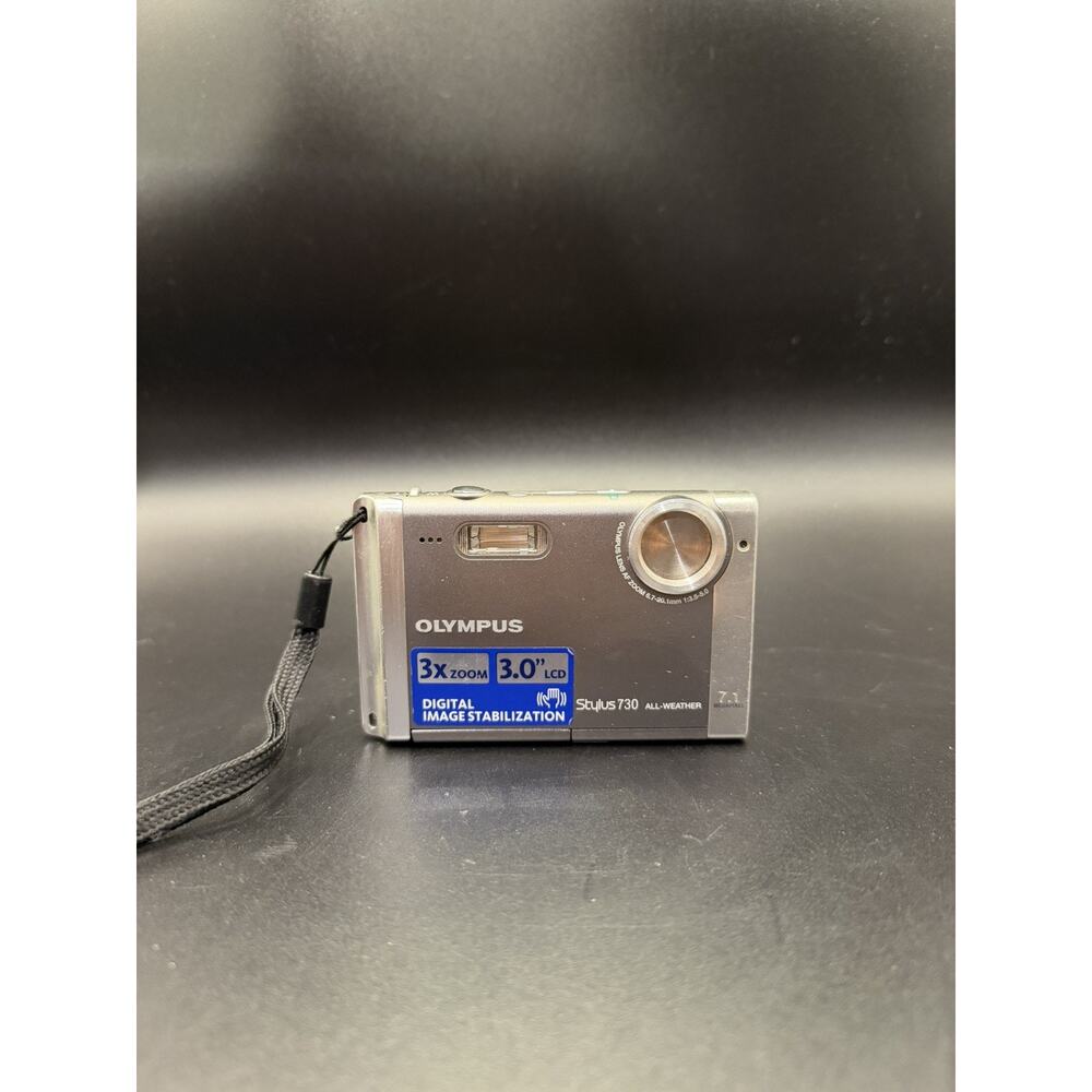 Olympus Stylus 7030 14MP Digital Camera – Silver – Untested, No Charger Battery